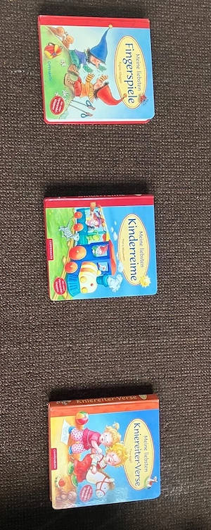 kinderspielsachen und büchlein Bild 5