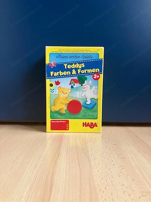 kinderspielsachen und büchlein Bild 3