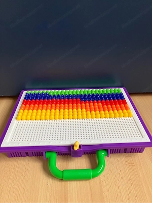 kinderspielsachen und büchlein Bild 4