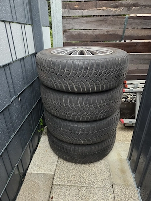 Stahlfelgen mit Radkappen 15 Zoll Bild 2