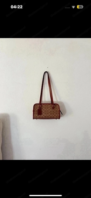 Coach Swing Zip Tasche
