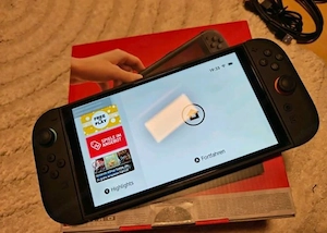 Nintendo switch 2 mit 4 spiele Bild 2