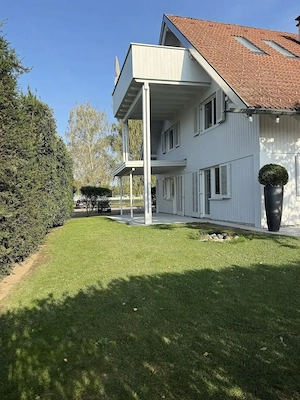 Stilvolles Wohnen mit Garten und viel Wohnkomfort mit Haus-im-Haus-Charakter Bild 2