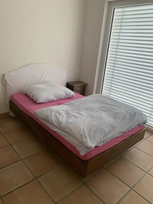 Bett Vollholz mit Kopfteil 
