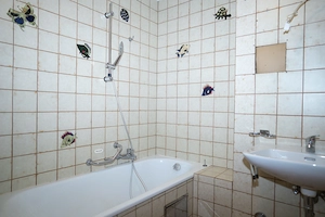 Attraktive Erdgeschosswohnung mit Wintergarten & Grünfläche Bild 3