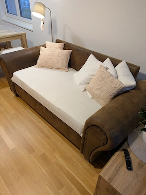 Ledercouch mit Bettfunktion und Sessel Bild 3